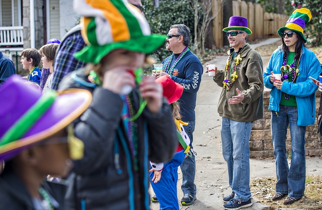 Grace Uihlein (right) and her husband Bill watch the Mead Rd. Mardi Gras Parade pass by on Saturday. Photo: Jonathan Phillips