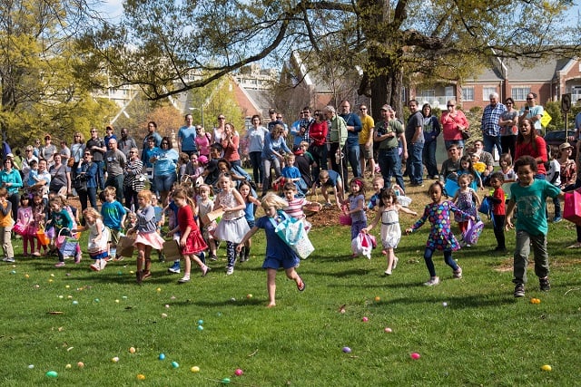 Children rush to gather eggs when the signal is given.