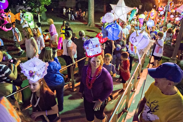 Thousands of people enter Decatur Square during the third annual lantern parade on Friday. Photo: Jonathan Phillips
