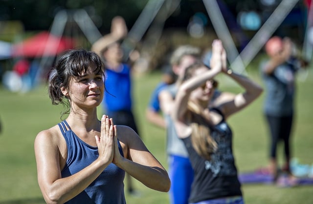 Holly Barbourpractices yoga during the Kirkwood Spring Fling on Saturday. Photo: Jonathan Phillips