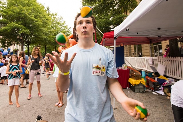 Joshua Spaugh gives a juggling lesson.