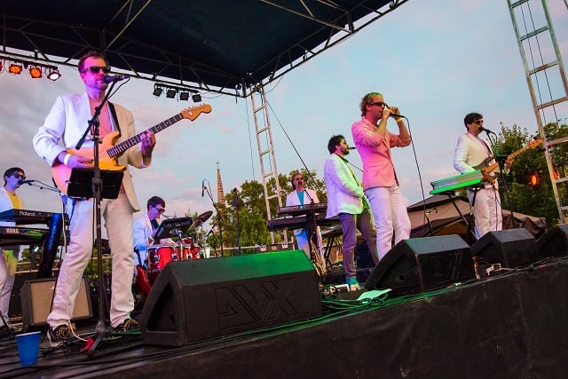 Electric Avenue performs in the Decatur Square during the beach party.