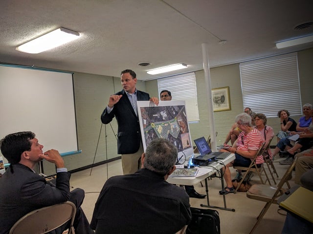 Jeff Garrison, a partner with developer S.J. Collins, speaks during a community meeting on June 13. Photo by Dan Whisenhunt