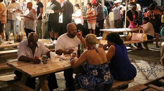 An overflow crowd chows down on the patio at Anna’s BBQ. Photo provided to Decaturish 
