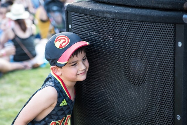 Asher Lewin listens closely to the music. Photo by Steve Eberhardt