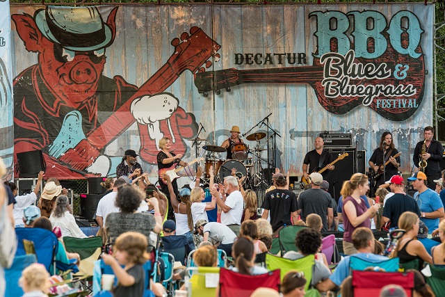 A crowd dances in front of the main stage at the Decatur BBQ, Blues, & Bluegrass Festival. Photo by Steve Eberhardt
