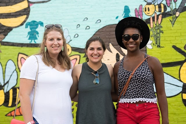 Torri, Alex, and Nydia enjoy the afternoon at the festival. Photo by Steve Eberhardt