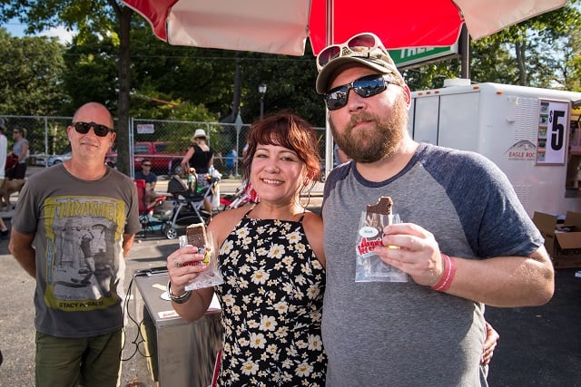 Larrisa and Shane cool off with ice cream sandwiches at the  Decatur BBQ, Blues, & Bluegrass Festival.