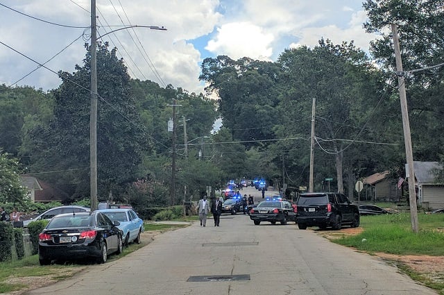 Numerous police vehicles responded to an Aug. 16 shooting at a park on Cedar Street. Photo by Dan Whisenhunt