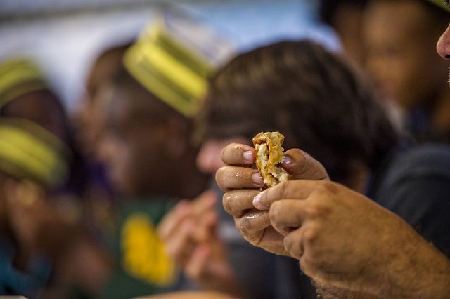 Contestants eat as many waffles as they can in five minute rounds at the Waffle House off of Decatur Square on Friday. Photo: Jonathan Phillips