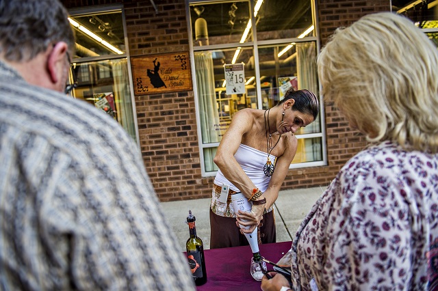 Marianela Belloso (center) pours wine during the Kirkwood Wine Stroll on Friday. Photo: Jonathan Phillips