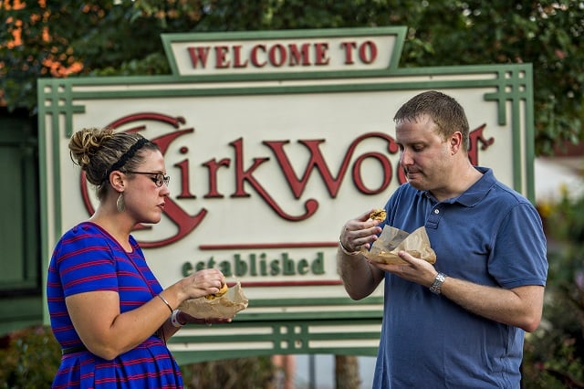 Julie Ladd (left) and her husband David take a break from wine for food during the Kirkwood Wine Stroll on Friday. Photo: Jonathan Phillips