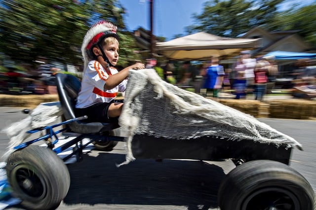 Pierce Haddad races down the street during the 6th annual Madison Ave. Soapbox Derby in Oakhurst on Saturday. Photo: Jonathan Phillips