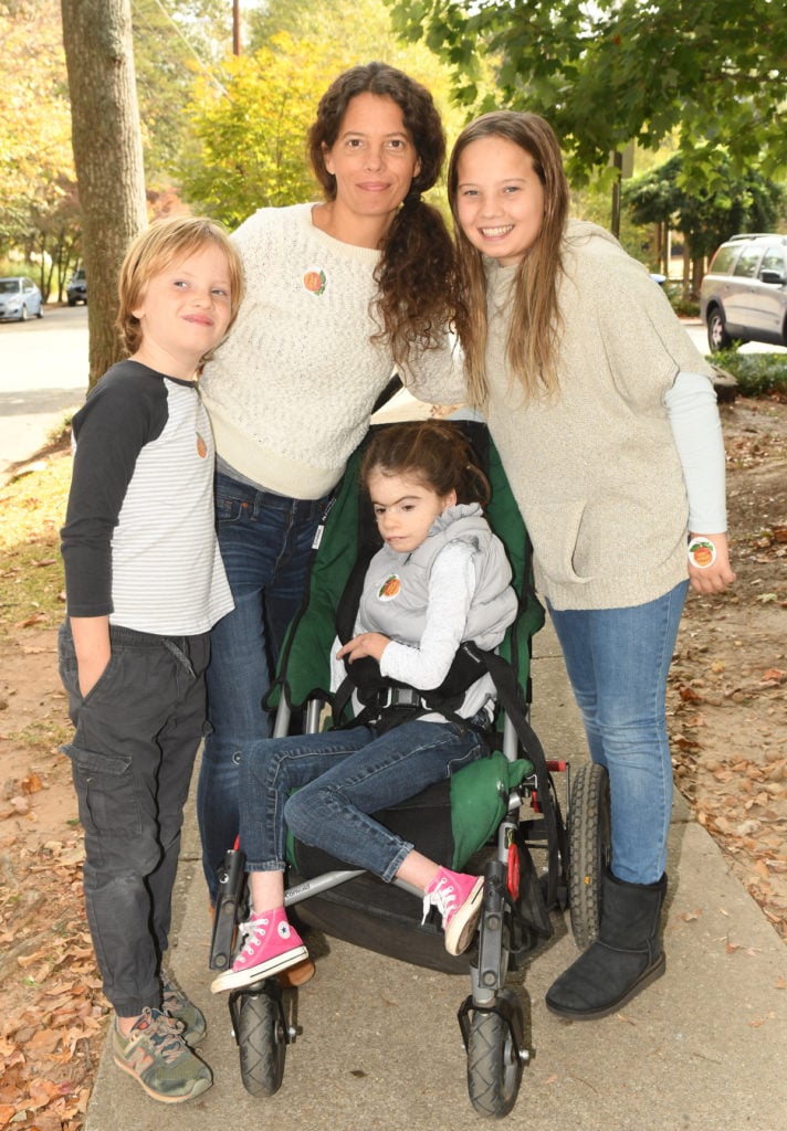 Jen Pomfret took her kids (left to right) Jake, 7, Maya, 13, and Hannah, 11, voting at Winnona Park Elementary School on November 8, 2016. Jen says, "We voted for Hillary. Bullies never win."