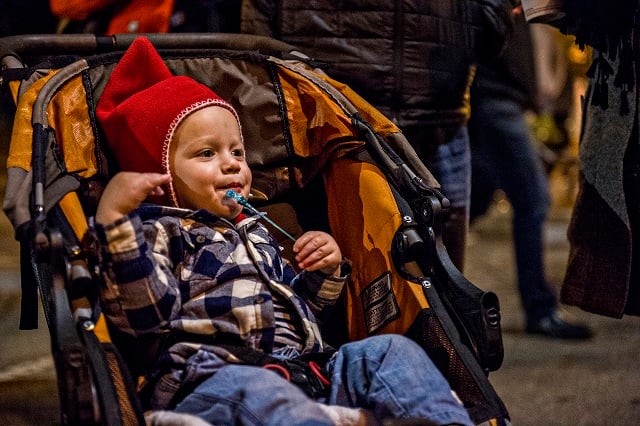 Murphy Fowler waits for Santa to arrive during the annual lighting of the tree in Decatur on Thursday. Photo: Jonathan Phillips
